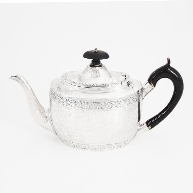 An English silver teapot, mark of Holland, Son & Slater (John Aldwinckle & James Slater), London 1882.