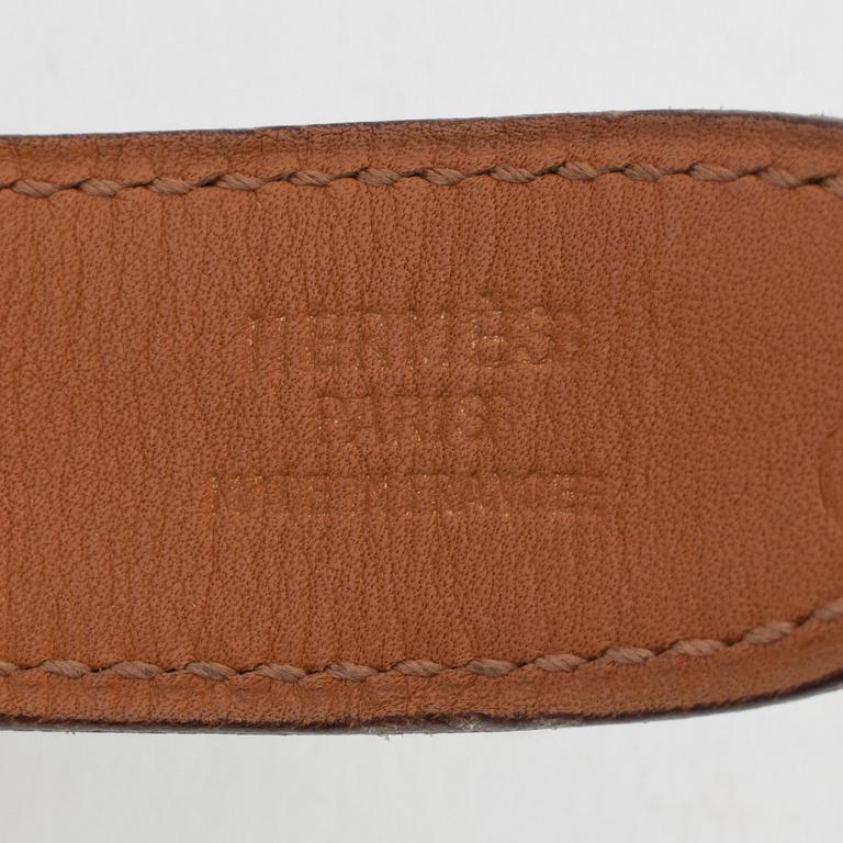 HERMÈS, a black leather belt, "Ceinture",