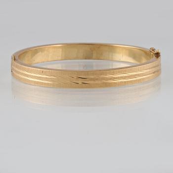 ARMRING, 14K guld, utländska stämplar. Vikt 26,2 gram.