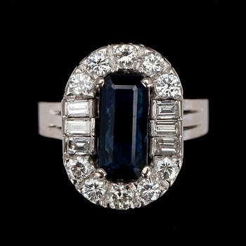 RING, vitguld 18K, safir 1,42 ct och diamanter tot. 1,42 ct. Vikt 35,2 g. Intyg.