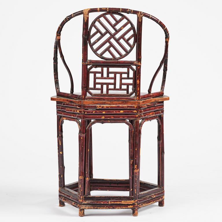 A Chinese bamboo horseshoeback armchair, late Qing dynasty.