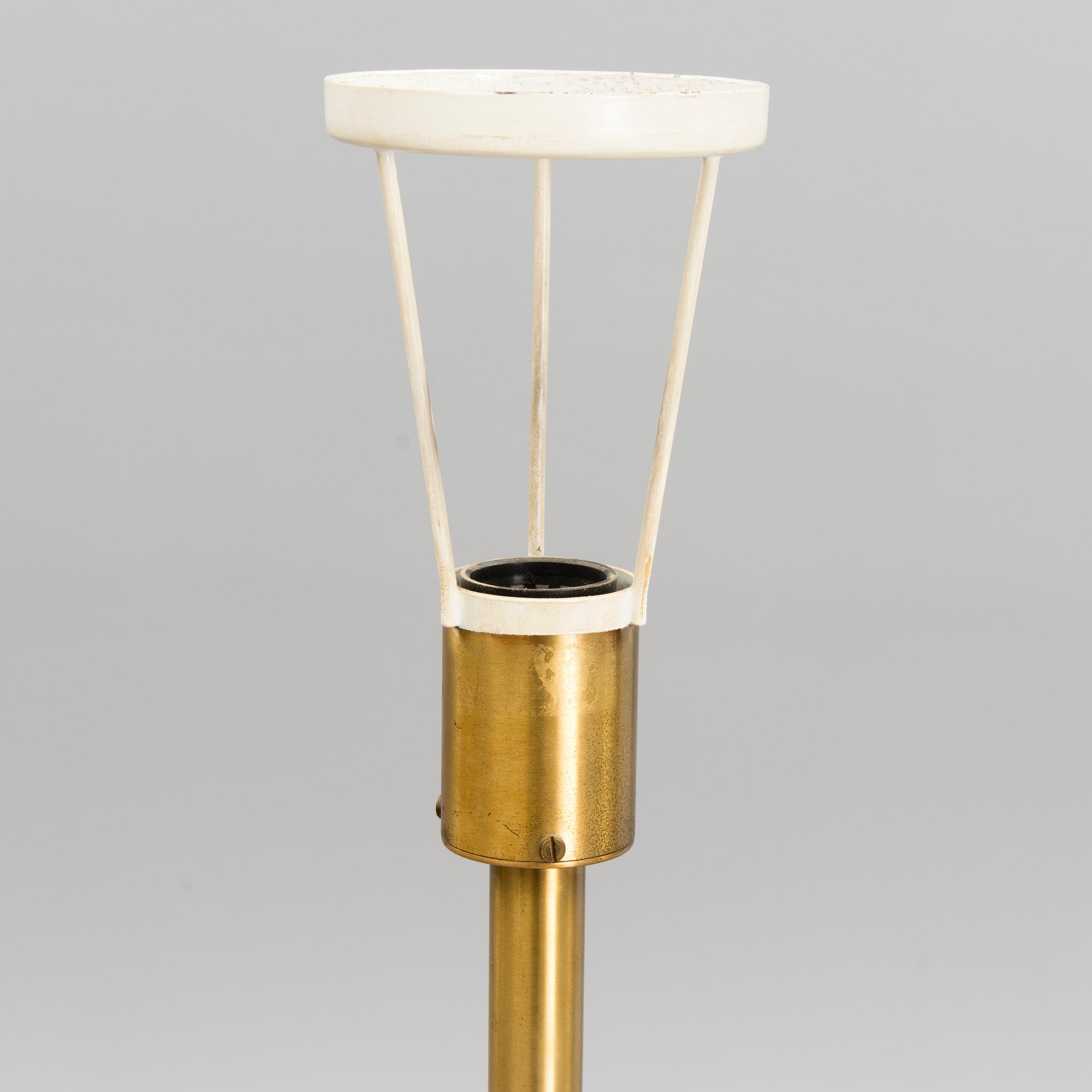 A 1970's floor lamp by Kai Ruokonen for Orno, Finland.