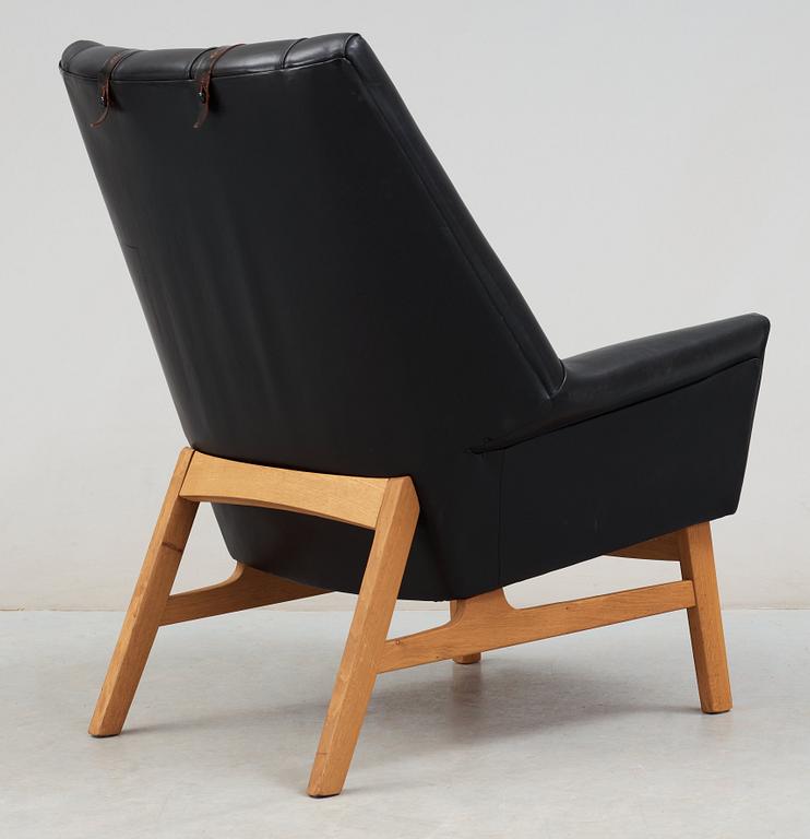 A Tove & Edvard Kindt- Larsen 'Glimminge' oak and black leather armchair, 1960's.