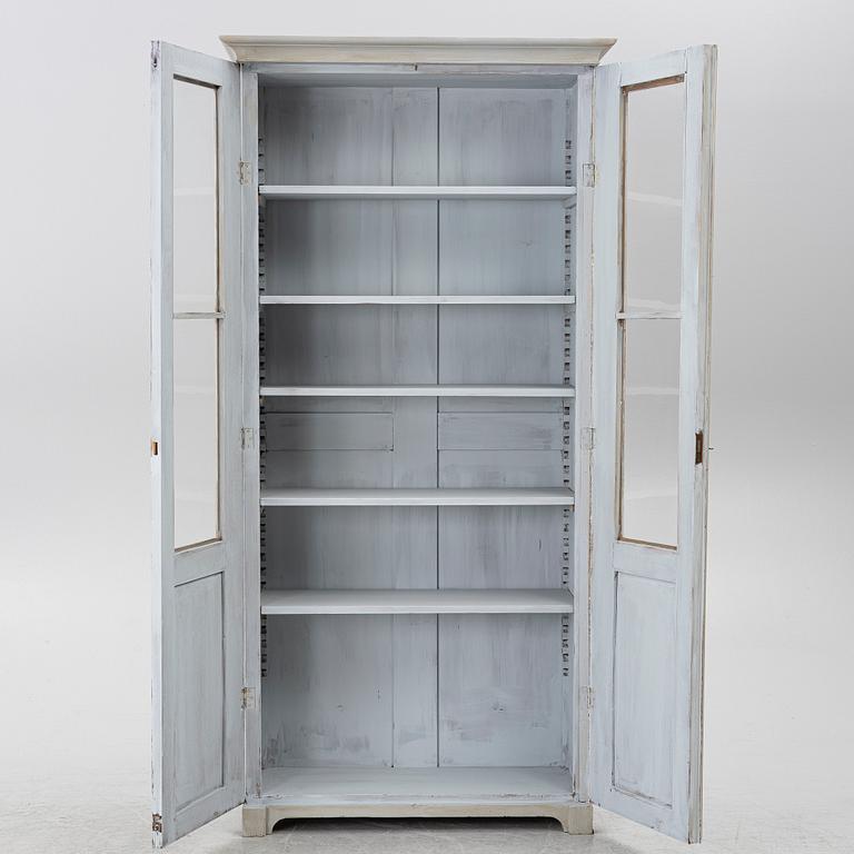 Display cabinet, circa 1900.