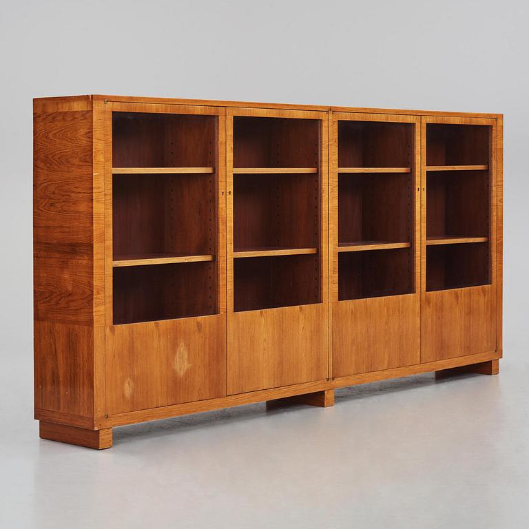 Carl Malmsten, a walnut bookcase, Sweden, 1930s.