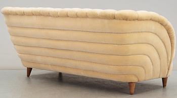 A Swedish off-white velvet plush three seated sofa, 1930-40's.