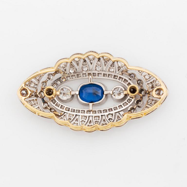 A brooch/necklace combination comprising two brooches and a necklace.