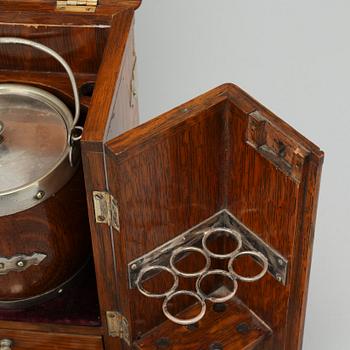 A small tobacco cabinet by BW & Co, early 20th century.