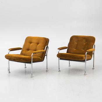 Bo Eigert, a pair of "Stålbo"  armchairs, Firma B. Eigert AB, Hova, Sweden, 1970's.