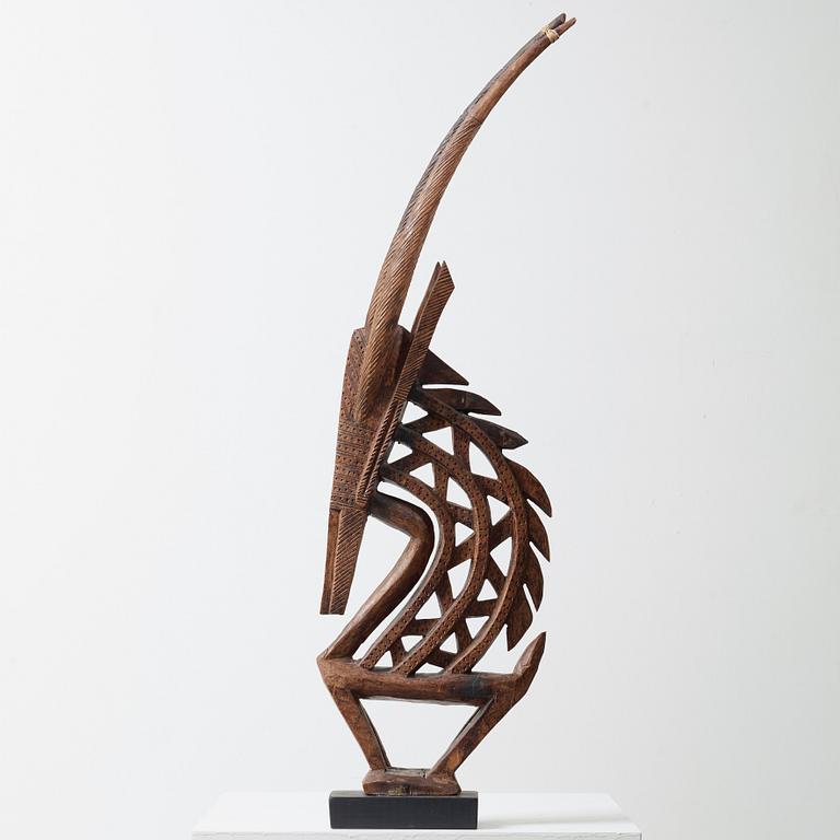 HEADDRESS Tshiwara/Ciwara (stylized male antelope). Wooden sculpture.