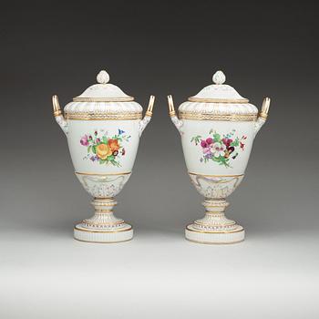 A pair of Berlin KPM jars with covers, circa 1900.