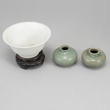 A white glazed bowl and two celadon glazed pots, Mingdynasty and older, shipwreck.