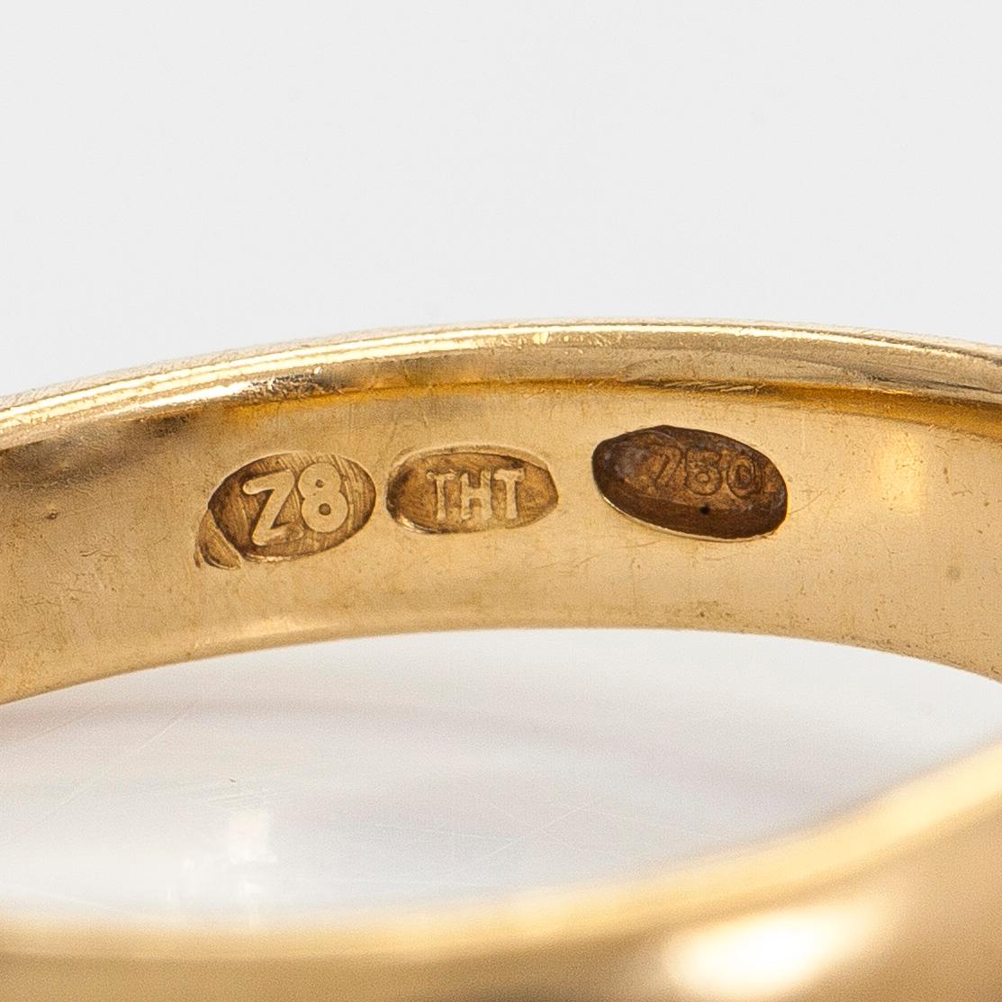 Ring, faceted sapphire, diamonds, 18K gold, H. Tuomaala, Finland 2001.