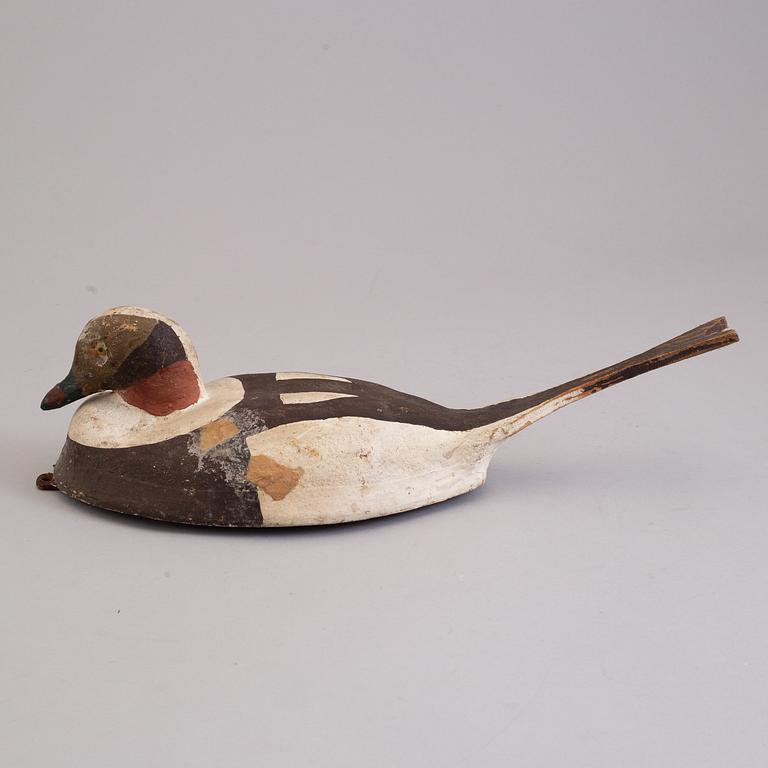 4 painted wooden ducks from the 20th century.