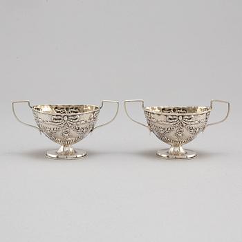 Charles Westwood & Sons, a pair of, silver salt cellars, Birmingham 1899.