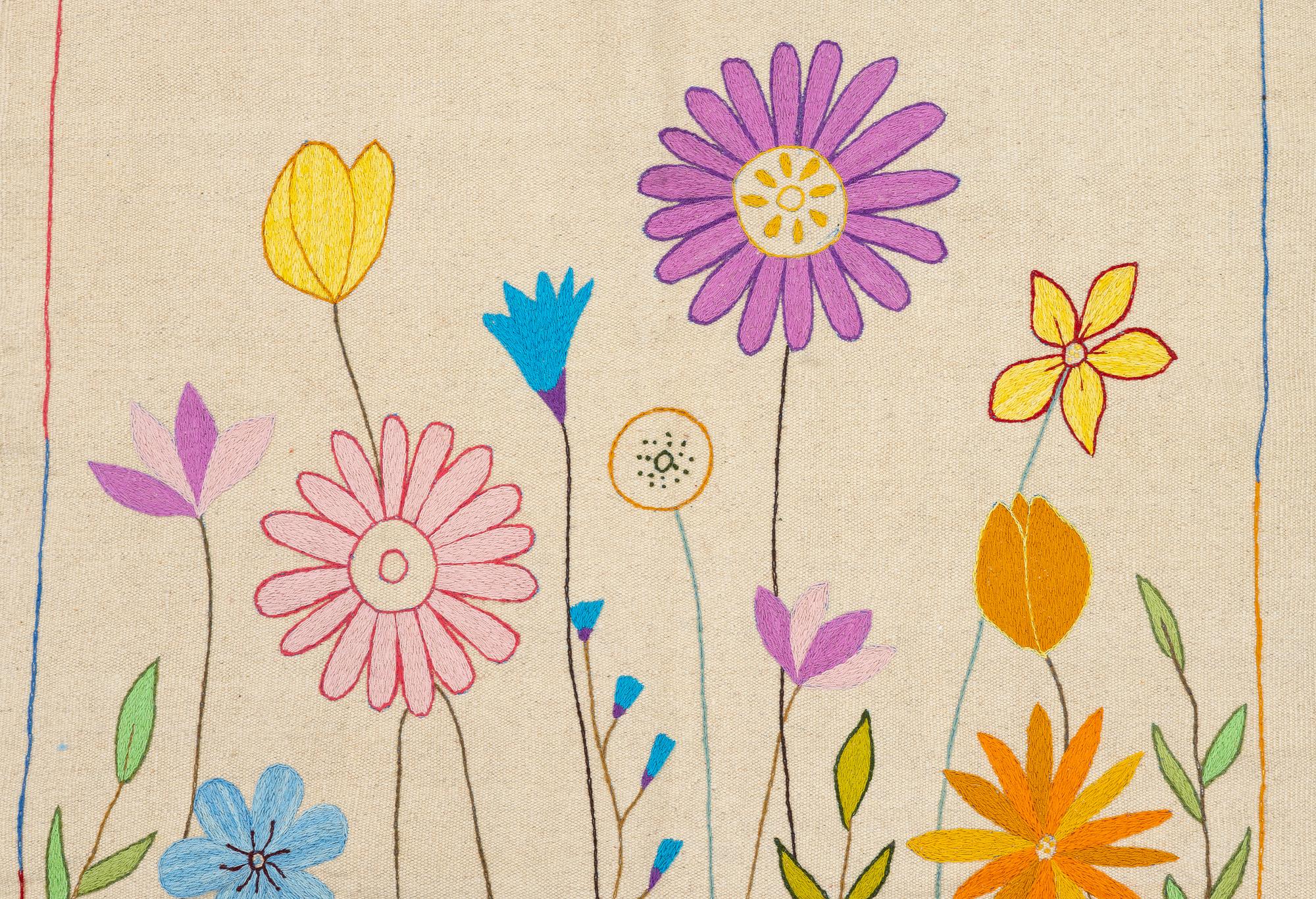 A hand-embroidered Kelim, c. 182 x 123 cm.