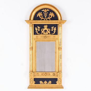 An Empire mirror, first half of the 19th Century.