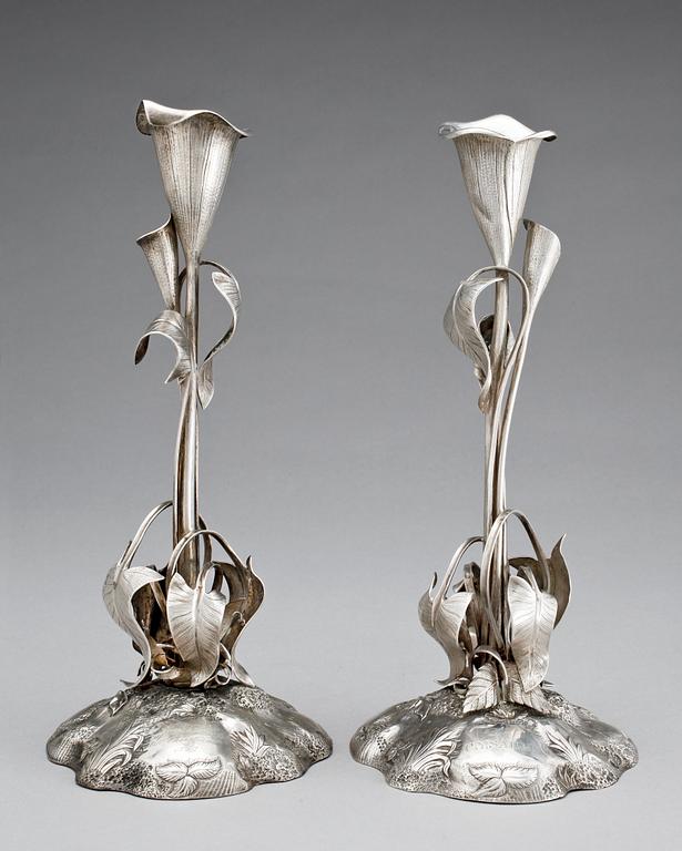 A pair of Swedish 19th century silver canlesticks, makers mark of Gustaf Möllenborg, Feron, Stockholm 1852.