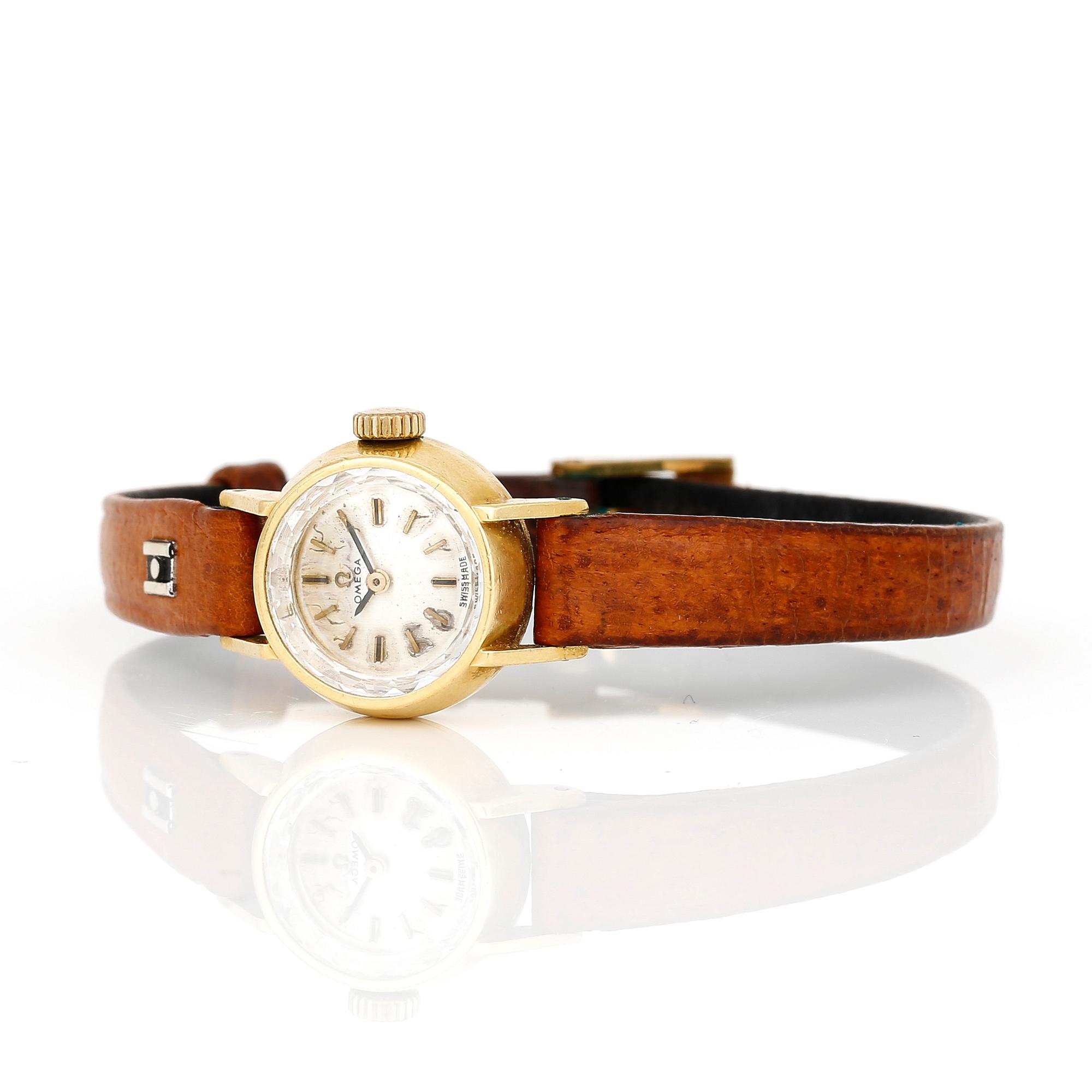 ARMBANDSUR, minst 18K guld, Omega, 1900-talets andra hälft.