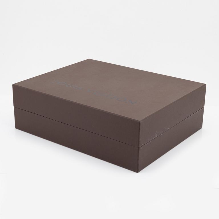 Louis Vuitton, a white canvas and gold 'Theda PM' bag, 2004.