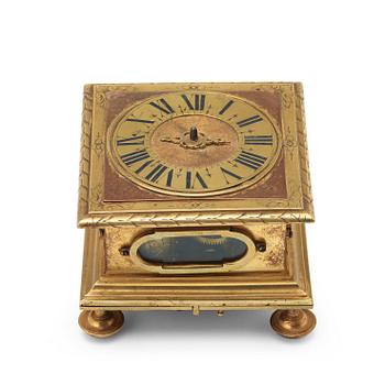 1281. A Baroque 17th century gilt copper table clock.