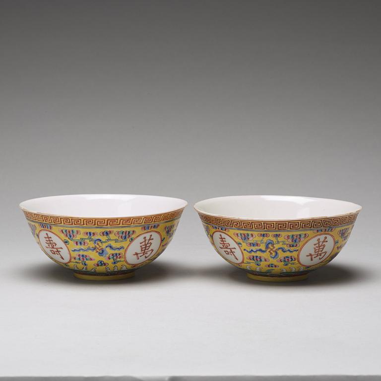 A pair of yellow glazed bowl, Qing dynasty with Guangxu mark in red.