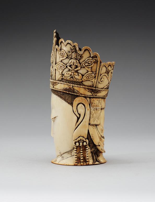 A carved ivory head of Guanyin, Qing dynasty.