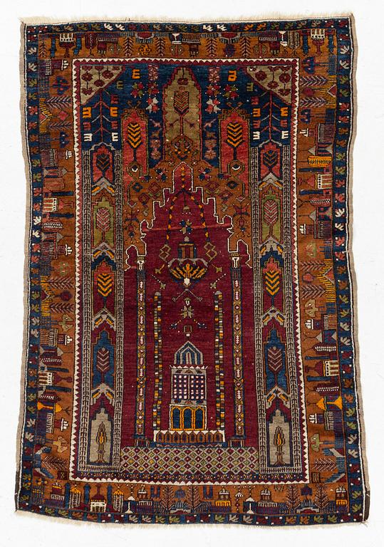 An antique rug, possibly Anatolian, approx. 170 x 102 cm.