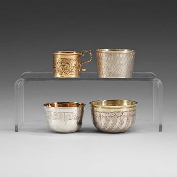 Four Russian 18th century parcel-gilt vodka-cups, unidentified makers marks, Moscow.