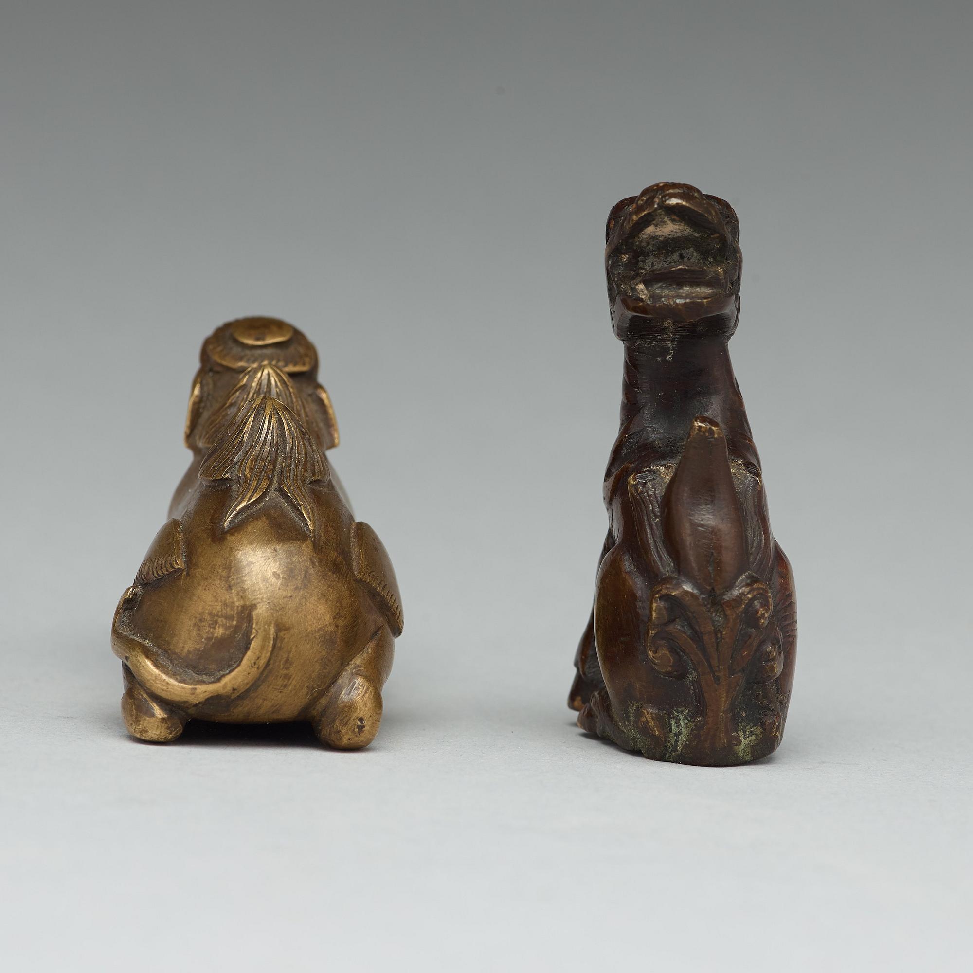 Two bronze pen rests, Qing dynasty, 18th Century.