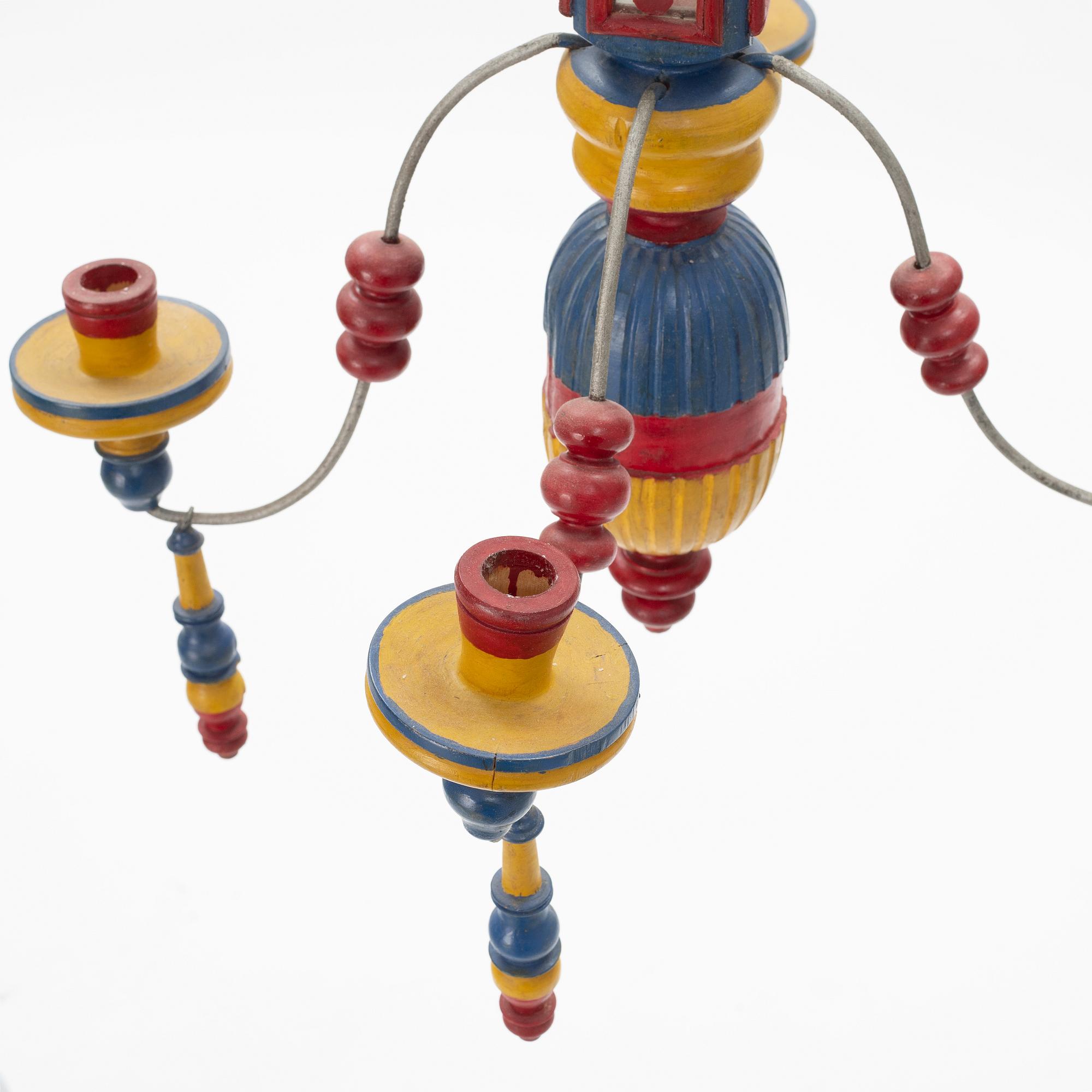 A pair of painted wood four-light chandeliers, second half of the 20th Century.