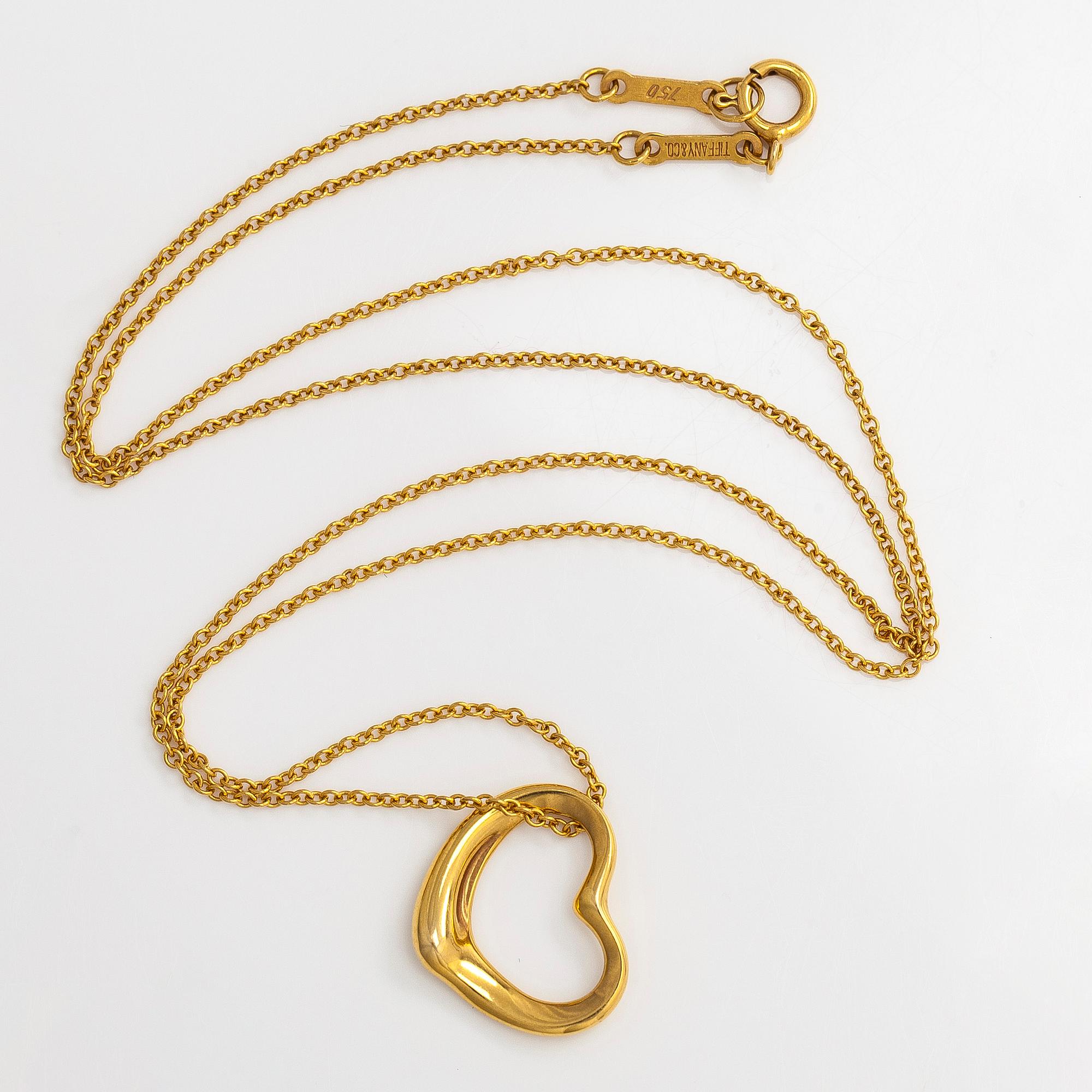 Tiffany & Co, Elsa Peretti, an 18K gold 'Open Heart' necklace.
