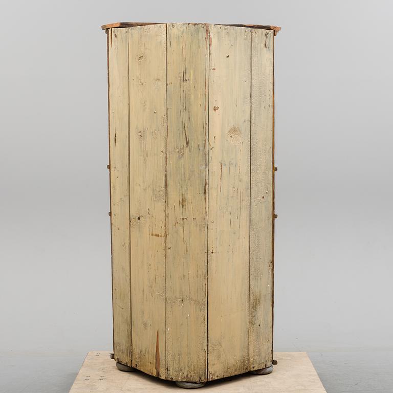 A first half of the 19th century painted corner cabinet.