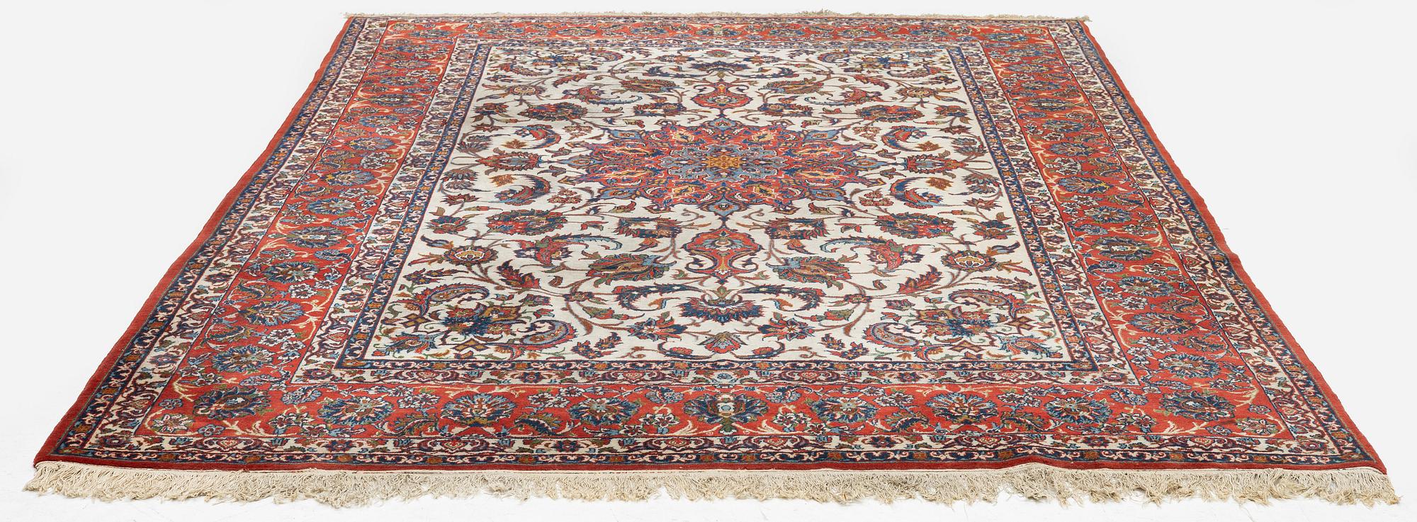 A semi-antique Isfahan carpet, central Persia, c. 314 x 197 cm.