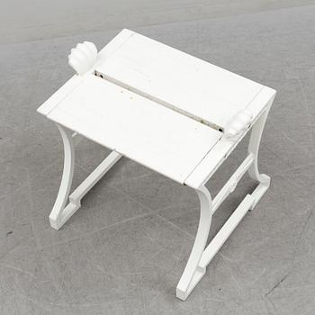 A "Sneckan" bench by Folke Bensow for Byarums bruk in the late 20th century.