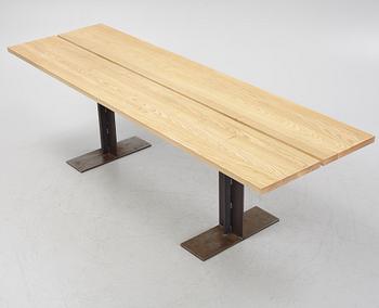 An ash and iron dining table by Sävar snicker.