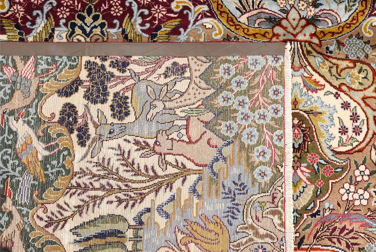 A Kashmar carpet, approx. 391 x 393 cm.