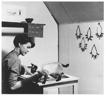 Vivianna Torun Bülow-Hübe, a necklace, wood, leather, mother-of-pearl and brass, most likely 1950's.