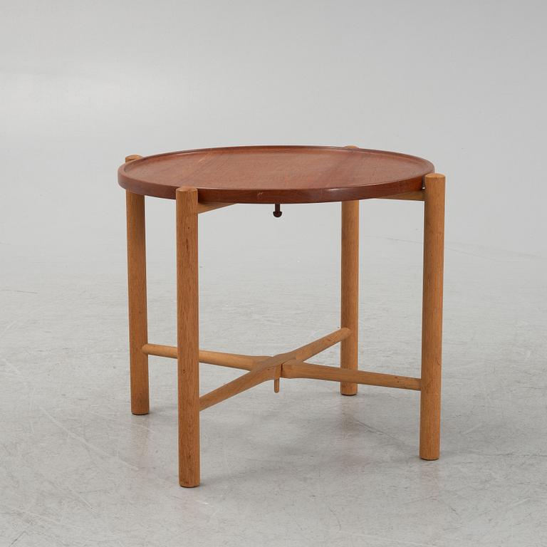 Hans J. Wegner, a model PP35 teak and oak tray table, Andreas Tuck, Denmark, mid 20th Century.