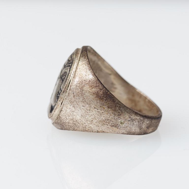 Signet ring, silver, man's profile, Mediterranean region.