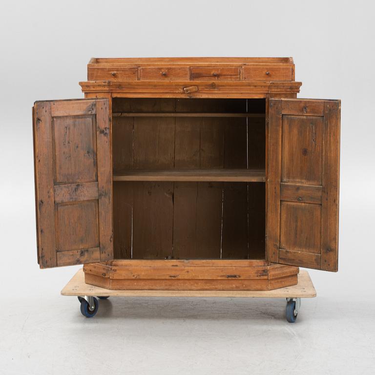 A pine wood cabinet, first part of the 19th Century.