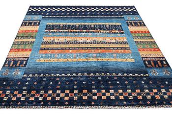 A Khorjin carpet, c. 287 x 246 cm.