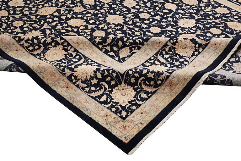 A carpet, Mashad, c. 548 x 383 cm.