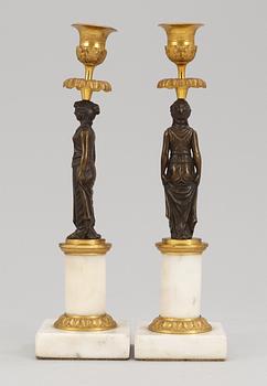 A pair of late Gustavian candlesticks.