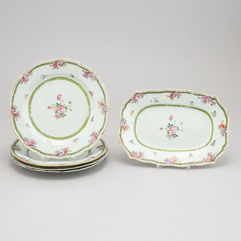 A set of four Chinese famille rose porcelain plates and one serving dish. Qing dynasty, Qianlong (1736-1795).