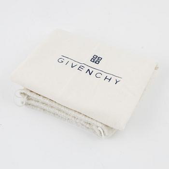 Givenchy, a black suede tote bag.