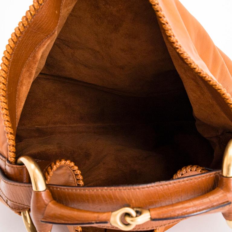 Gucci, a 'Horsebit Hobo' bag.