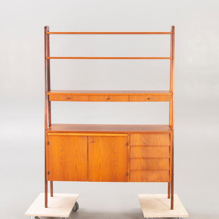 A teak mid 1900s book shelf.