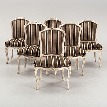 A matched set of six painted french rococo chairs, mid 18th Century.