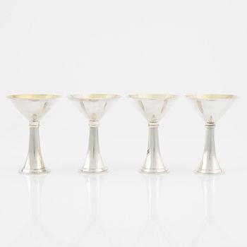 A Swedish silver decanter and four martini glasses, bearing the mark of HB Persson, Stockholm, 1953.